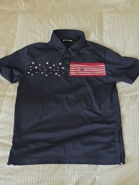 Travis Mathew Navy Polo with Red & White Flag Panels